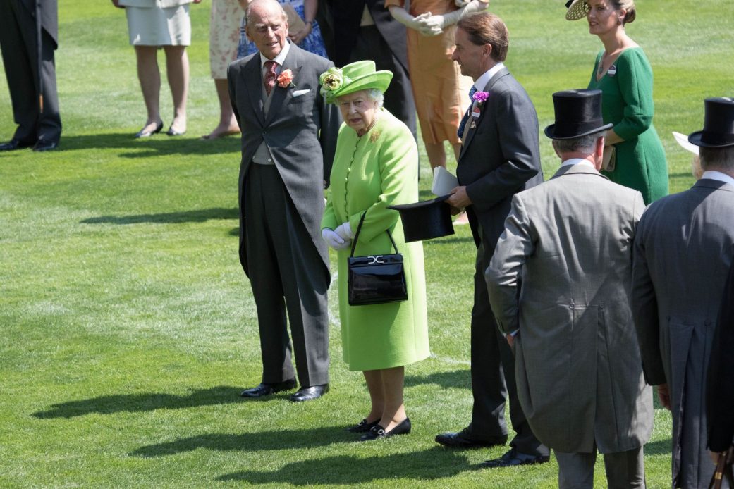 The Queen and the Royal family observe a minute's silence